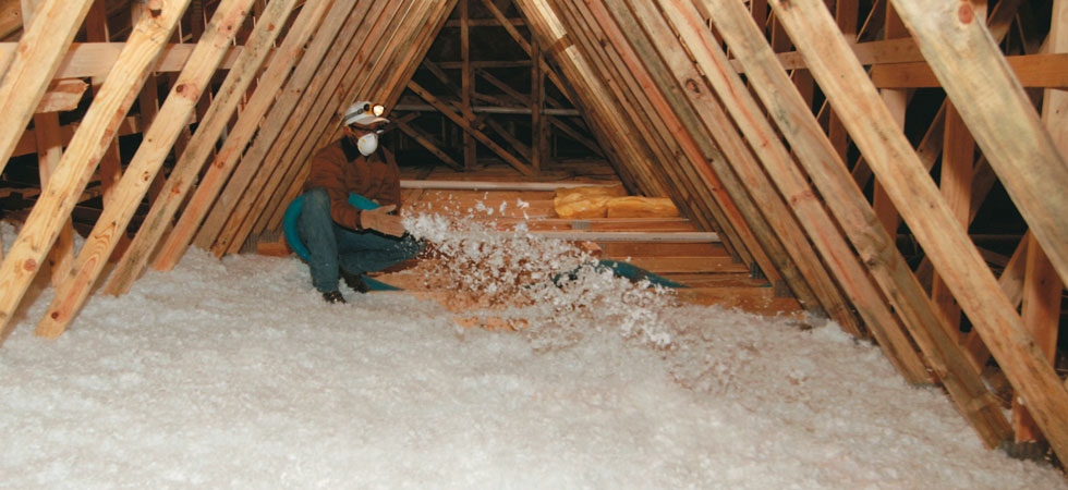 Man replacing furnace filter