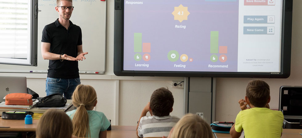 Teacher in front of classroom